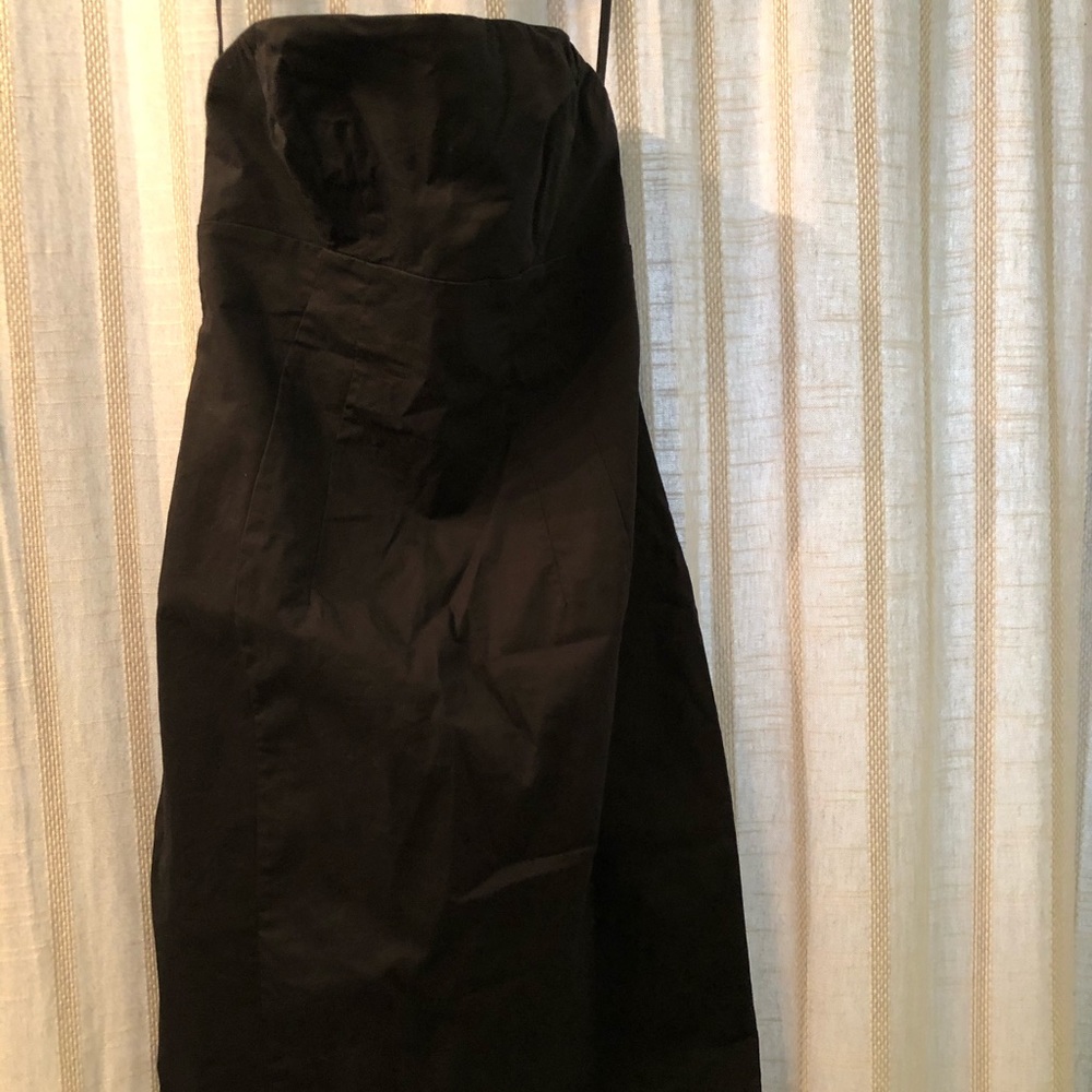 Black mid thigh length fitted strapless dress